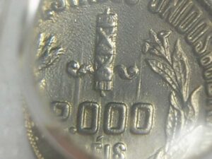 Raro recunho) 2.000 Réis - 1924 / Recunhada sobre uma outra moeda não identificada (existem recunhos destas moedas catalogadas) / Possivel ser recunho sobre 1923 ensaio-Liga / Sob/Fc - / Prata / Exemplar vindo de uma grande coleção./ Cod. 580
