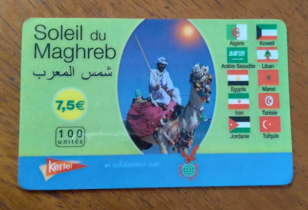 Cartao telefone Kertel . Soleil du Maghreb. Homem Camelo e Bandeiras