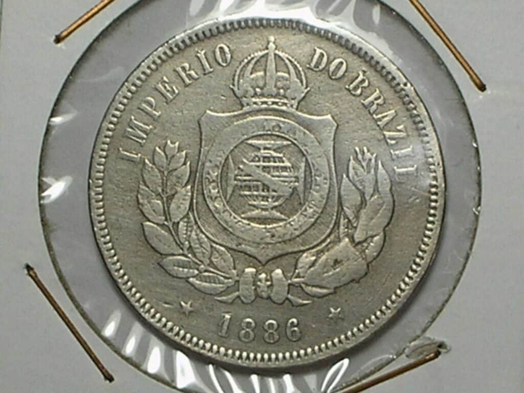 - 200 Réis - 1886 em Cu/Níquel do Império, raríssima nesse estado de conservação MBC e mais