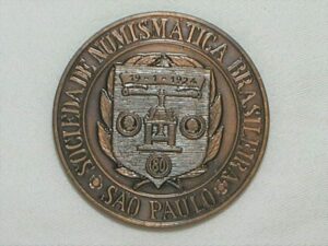 Medalha da SNB comemorativa do 1º congresso Latino Americano de Numismática de S. Paulo em 2003, reprodução da moeda rara Carimbo de Minas S/ Colunário 8 reales / Bronze / 57 gramas / 56 mm. / Flor de cunho