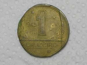 1 Cruzeiro - 1945 / anomalia de cunho - deformado / m170