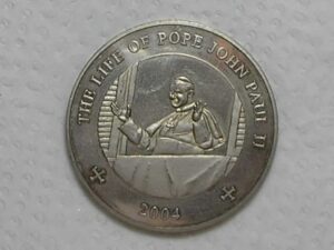 Somalia) 25 Shillings - 2004 - 1ª Série - A vida de João Paulo 2º / Prata / Fc / box13
