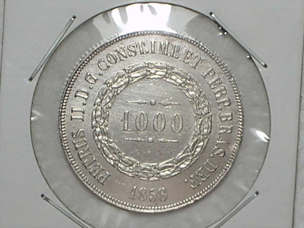 | Casa do Colecionador Flor de Cunho -- 1.000 Réis - 1858 / Império de Petrus II / Prata / Belíssima Moeda