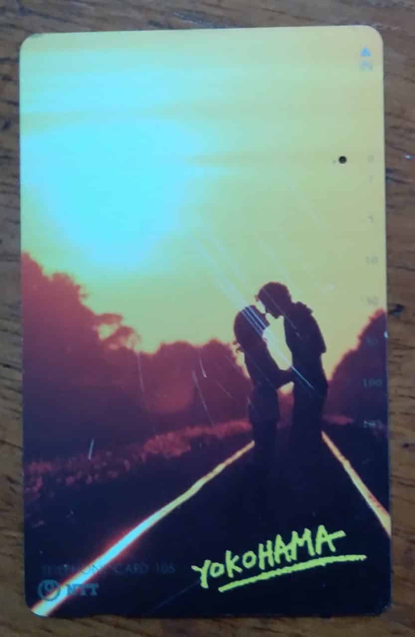 Cartão Japão NTT 251 Tamura 066 / Yokohama casal estrada sol.