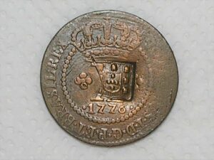 Escassa) X Réis – 1776 / 44 Perolas / *Corôa média e com pedículos / Data entre pontos / Escudete / Colônia de D. José I / Escassa / Cobre / Bc/Mbc / Box22