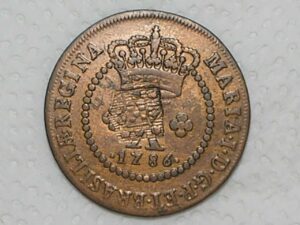 Escassa) X Réis – 1786 / 44 Perolas / Corôa Alta e com pedículos / Data entre pontos / Escudete / Colônia de D. Maria I / Escassa / Cobre / Mbc / Box22