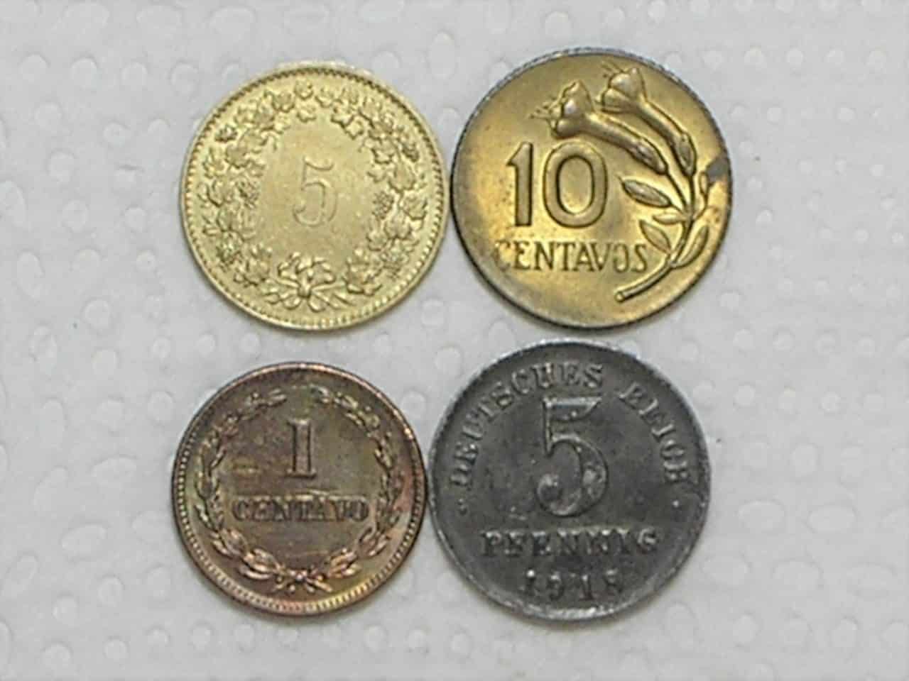 | Casa do Colecionador 4 Moedas) Alemanha 5 Pfennig - 1918 1ª guerra + Suiça 5 Rappen - 1983 + El Salvador 1 Centavo - 1972 + Peru 10 Centavos - 1967 / box 25