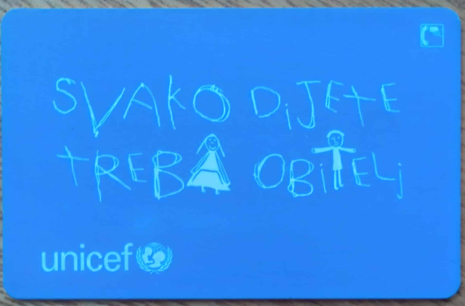 Cartão telefone Croácia Telekom Unicef azul e frase.