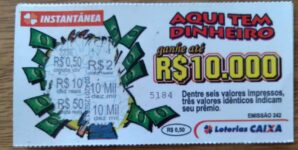Loteria Caixa Instantânea emissão 242 / Aqui tem dinheiro.