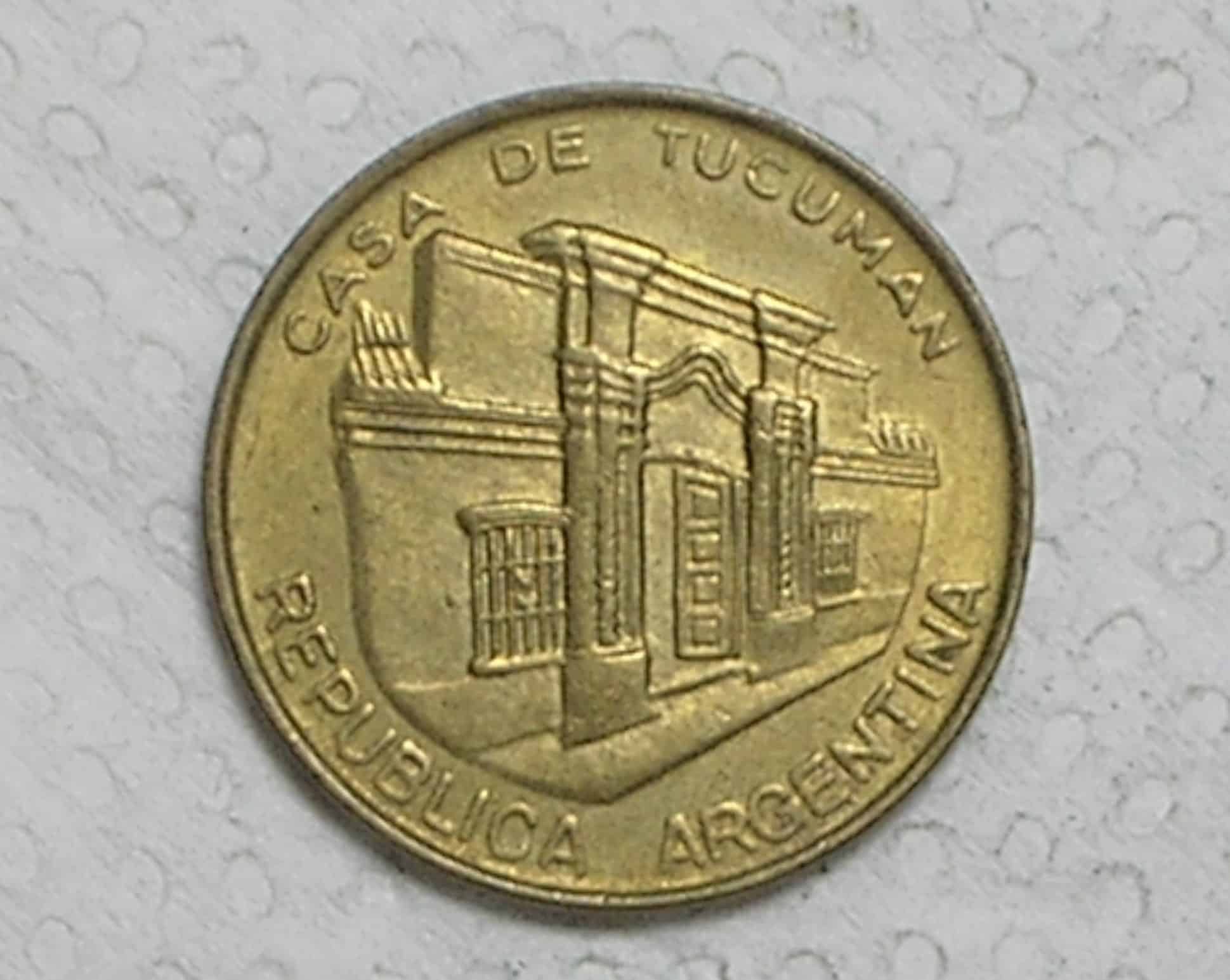 Argentina) 10 Pesos - 1985 / Casa de Tucuman / Sob / Brass / box33