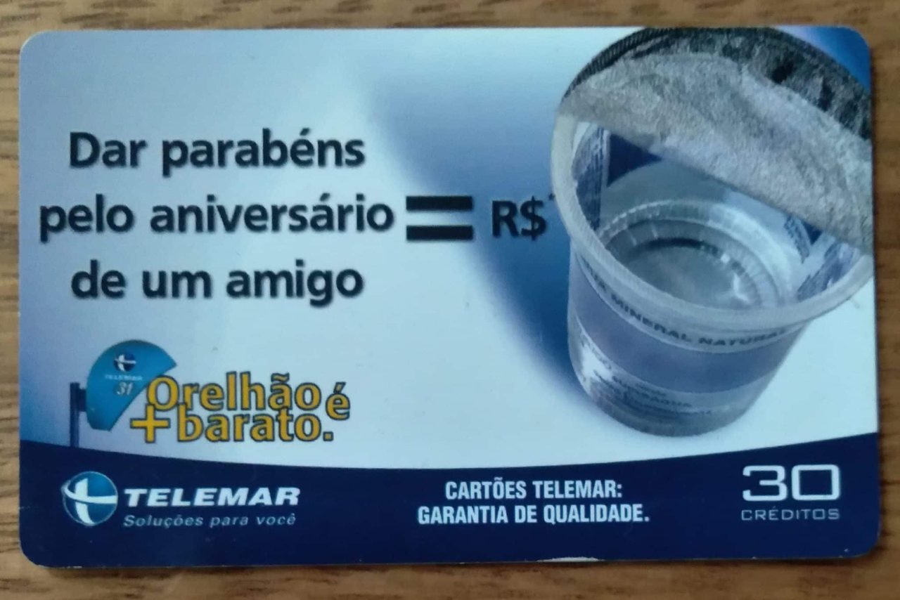 Cartão telefone Brasil. Telemar AL 2002. Orelhão Dar parabéns. ABNC 5700.