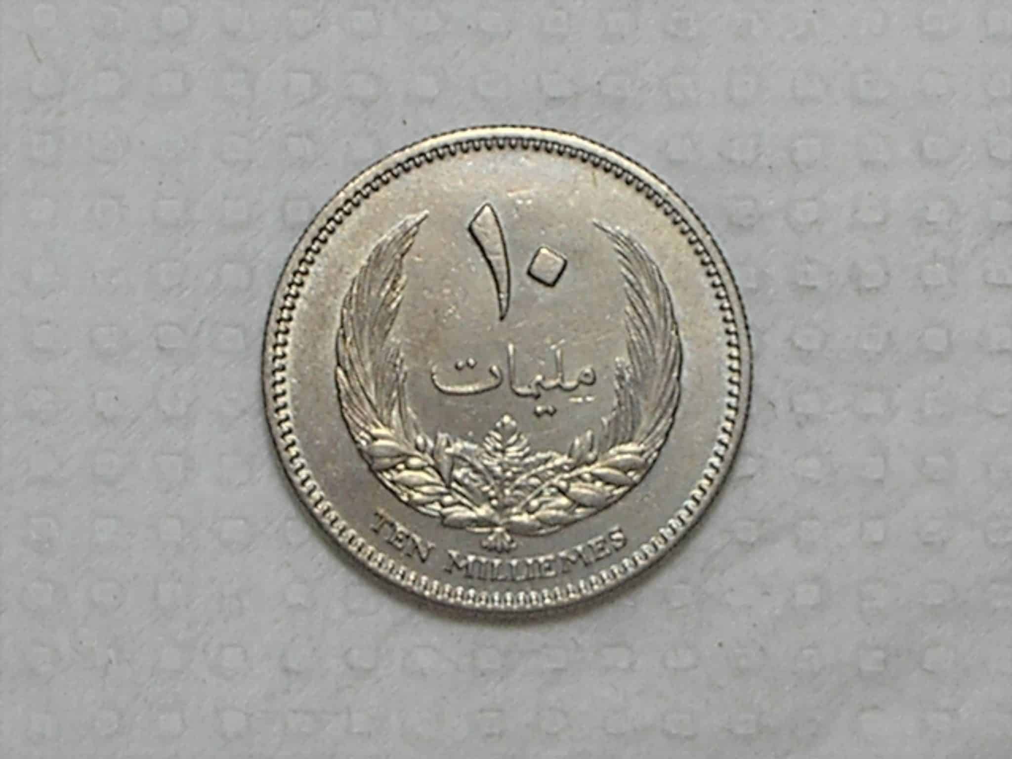 Libia) 10 Millieme - 1965 / Ah-1385 / Flor de cunho / Co/Ni / box45.2