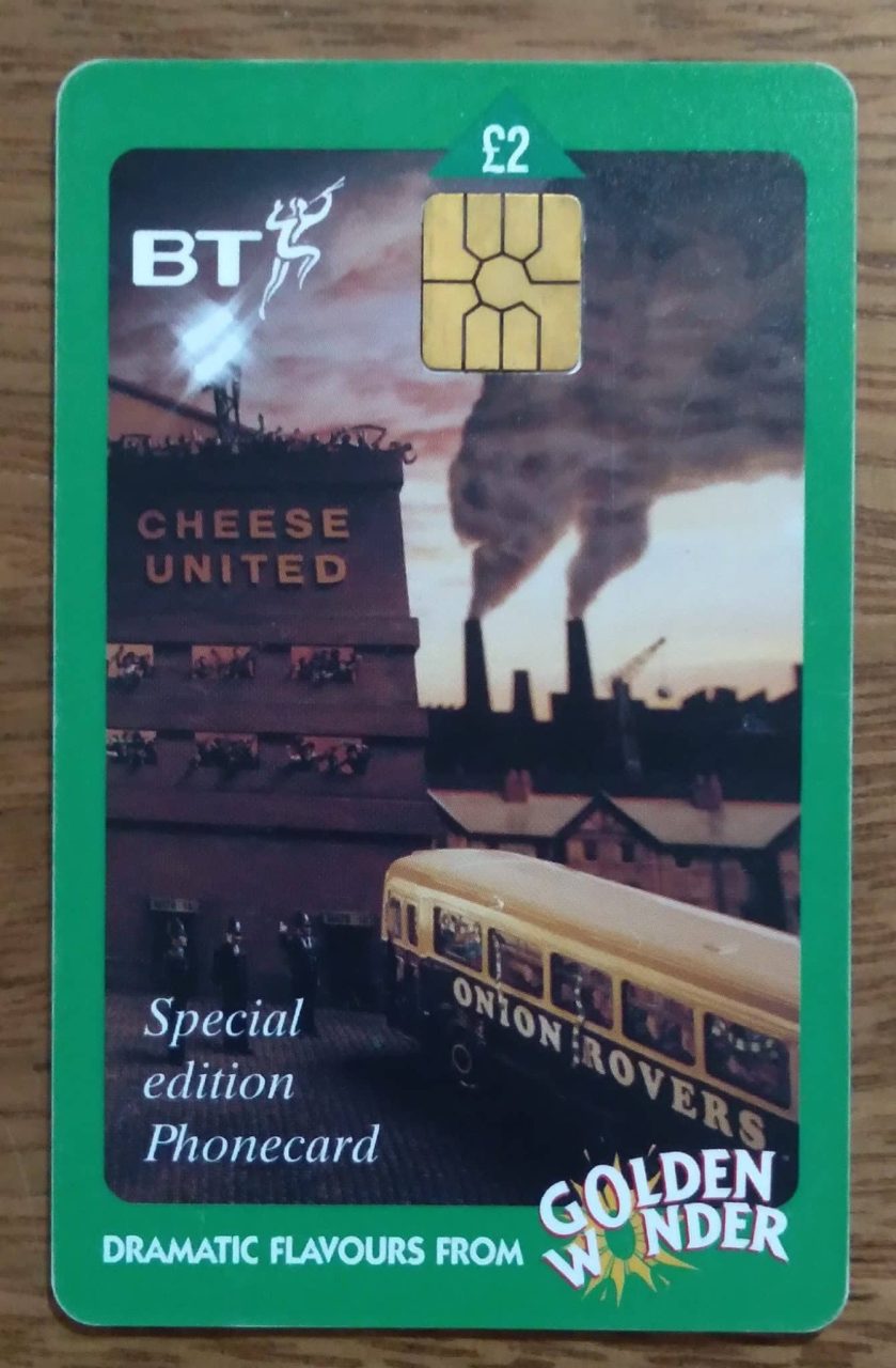 Cartão telefone Inglaterra BT Chip 1999. Mídia salgadinhos Golden Wonder Fábrica.