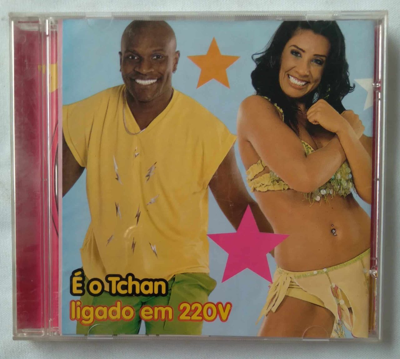 23DM Cd É o Tchan ligado em 220v. Tomada Mexa amor Tempo bom.