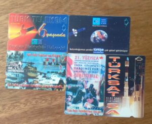 243T Cartão Telefone Turquia Telekom 2001. Foguete e polícia. Valor de cada ct.