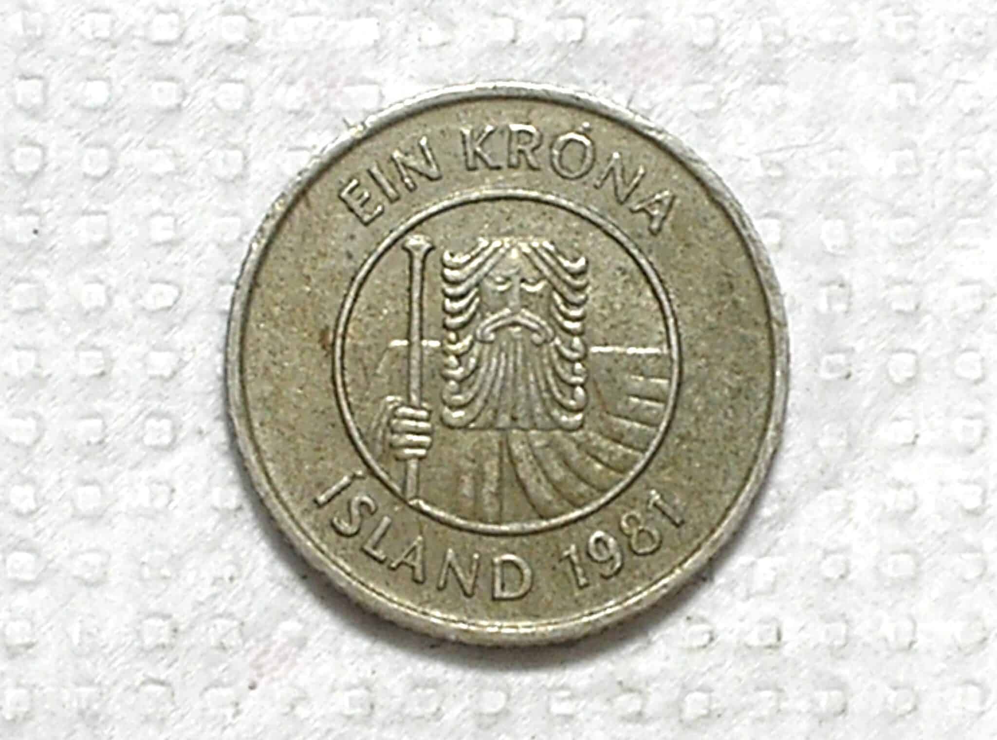 Iceland) 1 Krona - 1981 / 1ª da Série / 4,5g - 21mm / Co/Ni / box53
