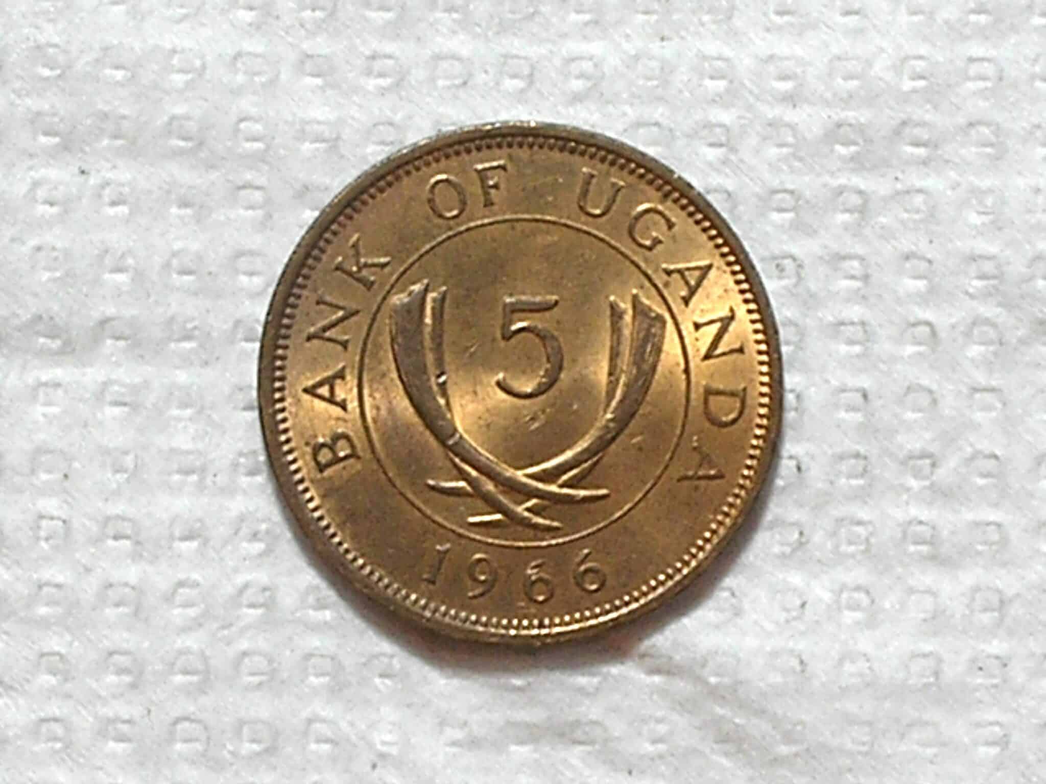 Uganda) 5 Cents - 1966 / 20mm / Bronze / Flor de cunho / box54