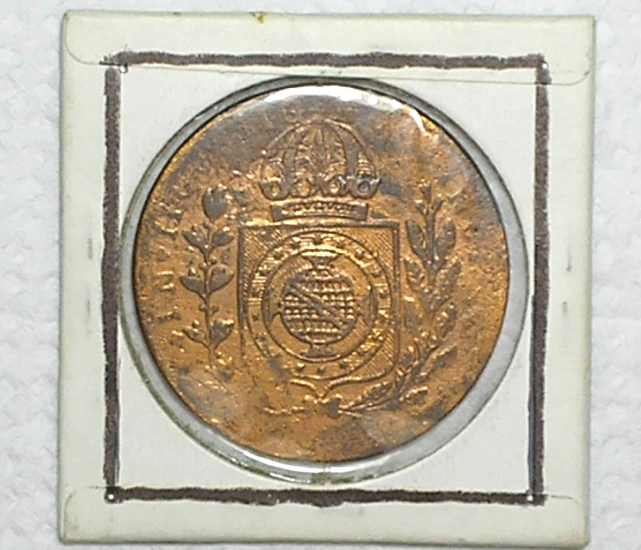 | Casa do Colecionador 80 Réis - 1831 - G "Goias" / 24 T / Data e letra monetária entre cruzetas / Rara / Cobre / Bc/Mbc - Difícil aparecer tão bonita assim / Cod.300