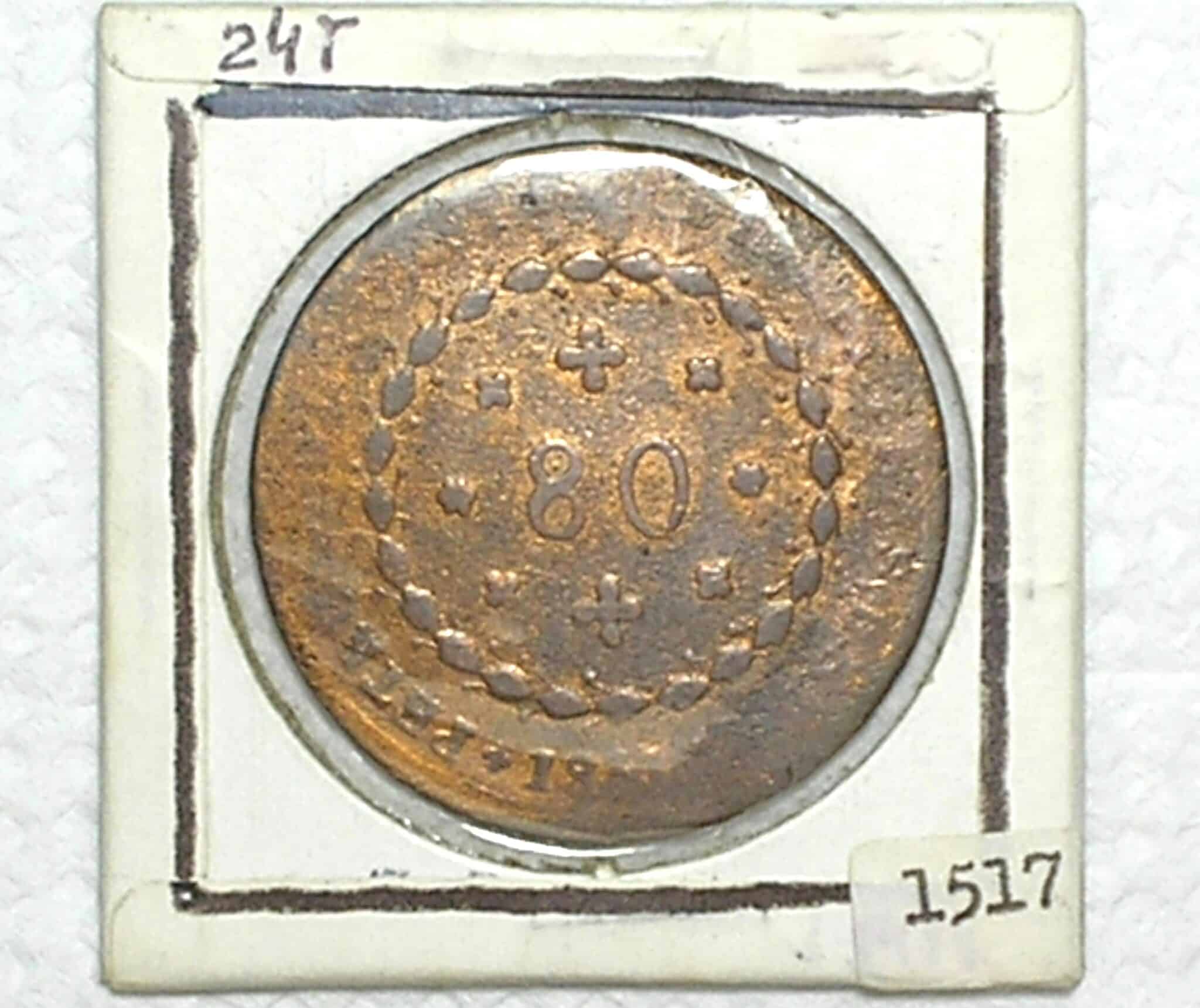 | Casa do Colecionador 80 Réis - 1831 - G "Goias" / 24 T / Data e letra monetária entre cruzetas / Rara / Cobre / Bc/Mbc - Difícil aparecer tão bonita assim / Cod.300