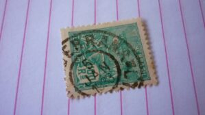 SELO 100 RÉIS COM CARIMBO SERRANA LOTE 497 .