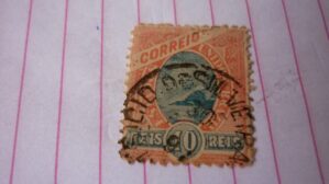 SELO 10 RÉIS COM CARIMBO CID. DE SILVEIRA LOTE 988 .
