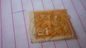 SELO 100 RÉIS COM CARIMBO ARAGUARY LOTE 949 .