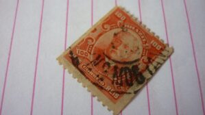 SELO 100 RÉIS COM CARIMBO MOGIANA LOTE 710 .