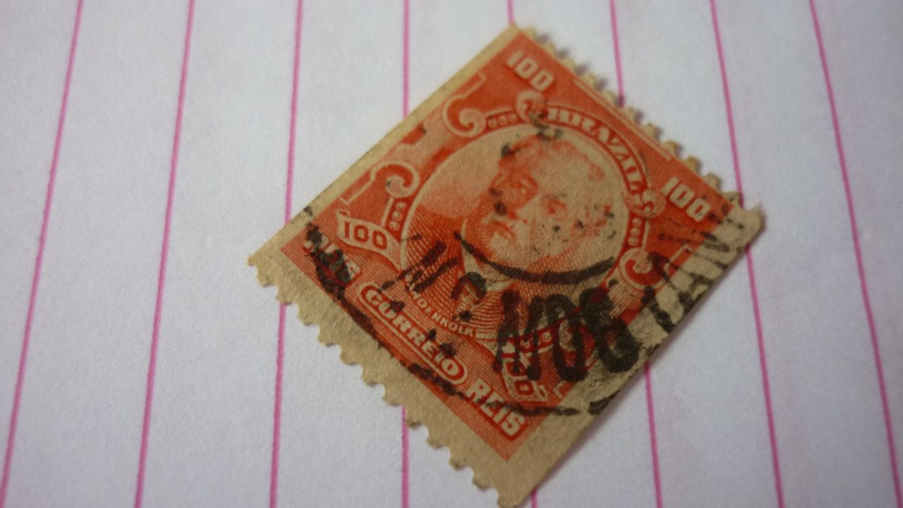 SELO 100 RÉIS COM CARIMBO MOGIANA LOTE 710 .