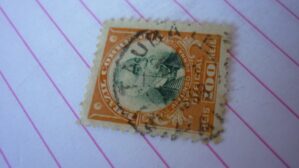 SELO 100 RÉIS COM CARIMBO TAUBATE LOTE 1227 .