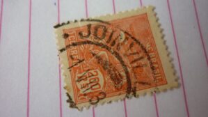 SELO 200 RÉIS COM CARIMBO JOINVILLE LOTE 724 .