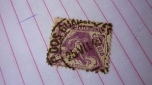 SELO 200 RÉIS COM CARIMBO P.DOS GUAIANAZES LOTE 1102 .