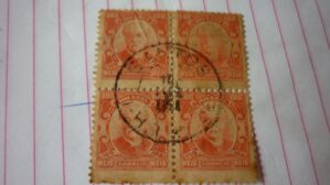SELO QUADRA 100 RÉIS COM CARIMBO SANTOS LOTE 786 .