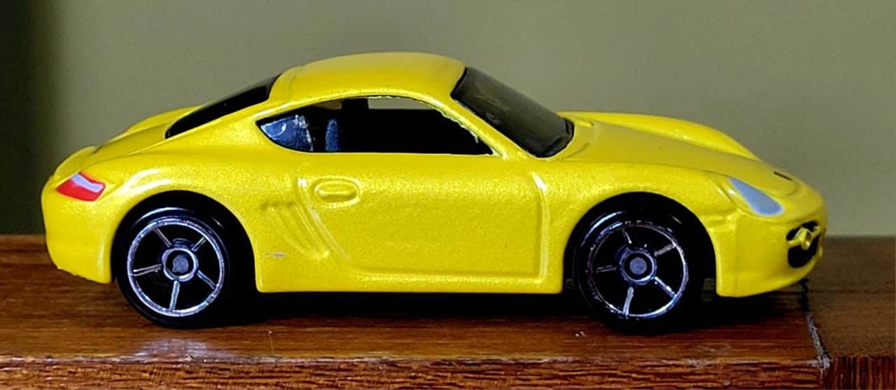 Hot Wheels Porsche Cayman S Amarelo (1ª Edição) Ano 2008