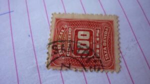 SELO 100 RÉIS COM CARIMBO SANTOS LOTE 1285.