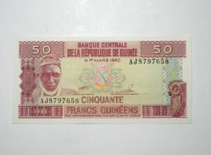 República de Guiné / Cédula Estrangeira / 50 Francs - 1985 / República comemorativa 1º de Março de 1960 / Flor de Estampa