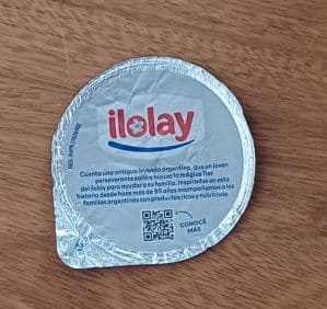 Embalagem tampa lacre. Alimentos Ilolay Argentina.