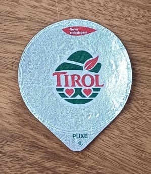 Embalagem tampa lacre. Alimentos Tirol nova.