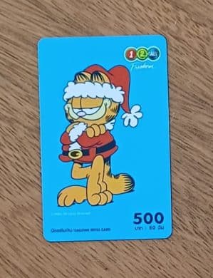 Cartão telefone Tailândia 12call Freedom. Garfield fundo azul.